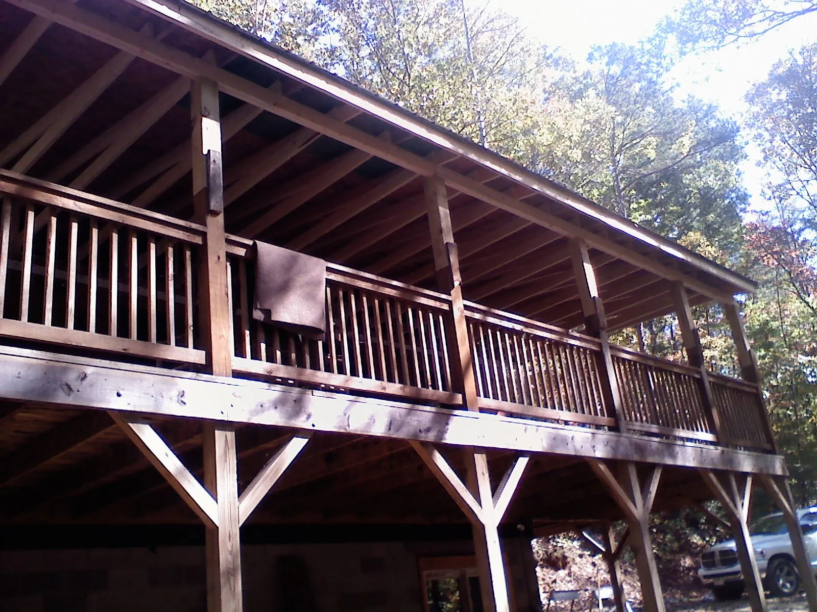 Timber framing under a new elevated porch and deck — Roof Leak Repair in Nettleton by Roofing Brothers